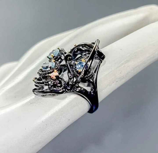 Anello in Argento 925 con Topazio Blu e Placcatura Rodio Nero e Oro