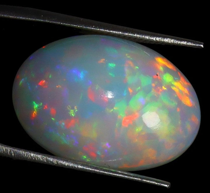 Natural Ethiopian Fire Opal - 9.86ct AAA Rainbow Cabochon