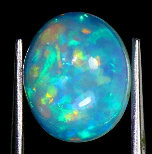 Natural Ethiopian Fire Opal 3.75ct - AAA Rainbow Luster Oval Cabochon