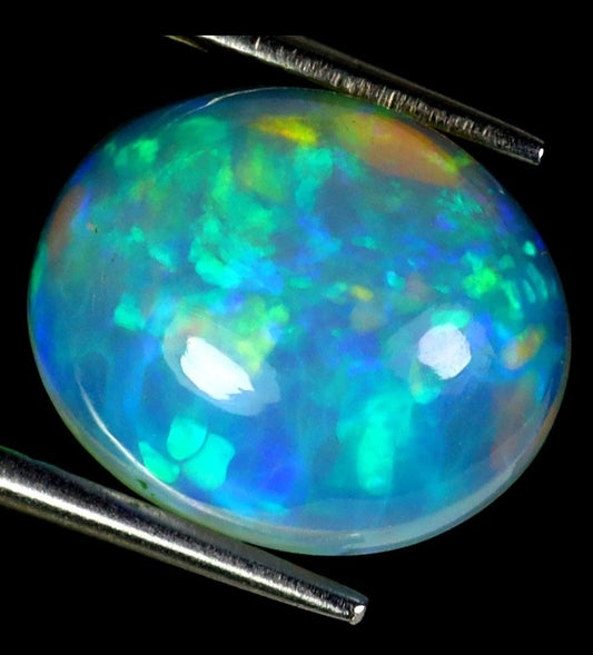 Natural Ethiopian Fire Opal 3.75ct - AAA Rainbow Luster Oval Cabochon