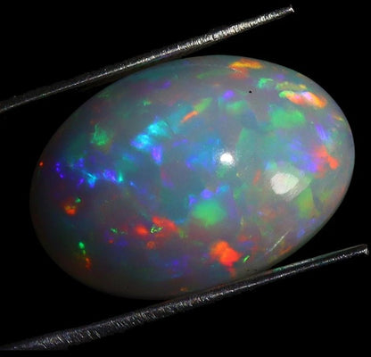 Natural Ethiopian Fire Opal - 9.86ct AAA Rainbow Cabochon