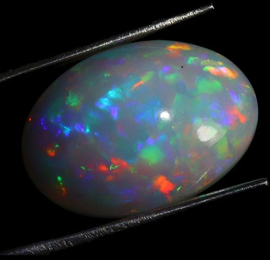 Natural Ethiopian Fire Opal - 9.86ct AAA Rainbow Cabochon