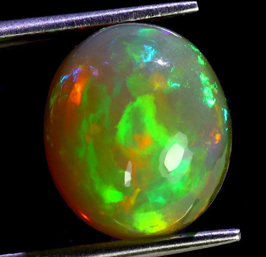 Ethiopian Fire Opal 3.73ct - AAA Hot Rainbow Luster Oval Cabochon