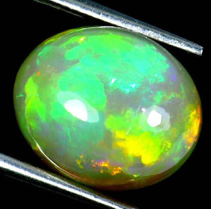 Ethiopian Fire Opal 3.73ct - AAA Hot Rainbow Luster Oval Cabochon