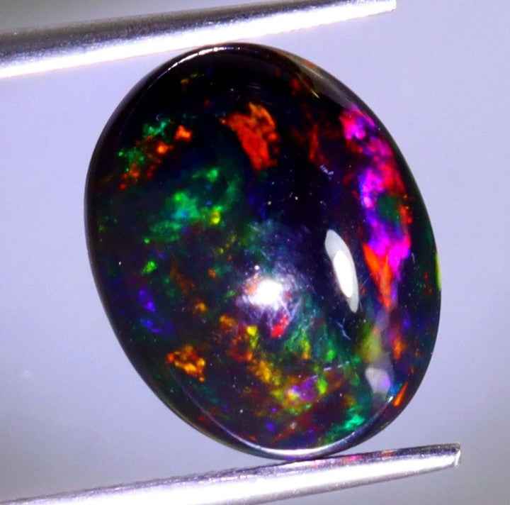 Natural Ethiopian Black Opal - 3.36ct Oval Cabochon