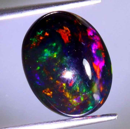 Natural Ethiopian Black Opal - 3.36ct Oval Cabochon