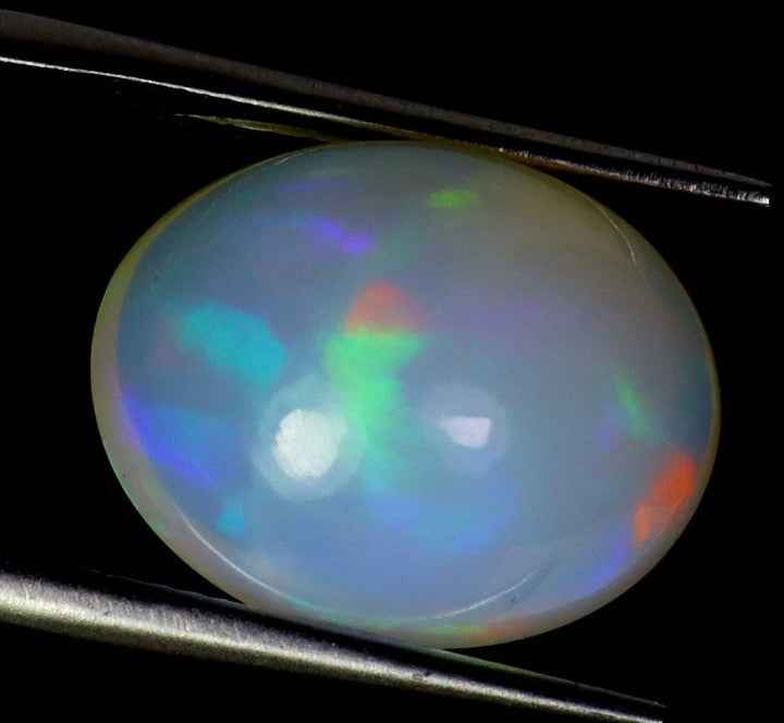 Natural Ethiopian Fire Opal - 6.93ct AAA Hot Rainbow Luster