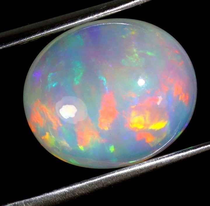 Natural Ethiopian Fire Opal - 5.7ct Oval Cabochon