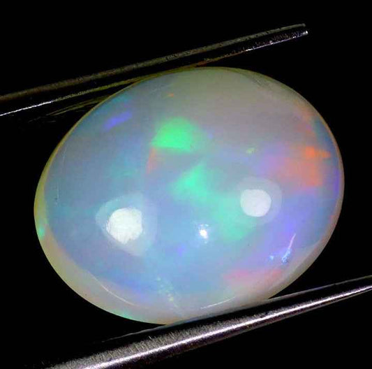 Natural Ethiopian Fire Opal - 6.93ct AAA Hot Rainbow Luster