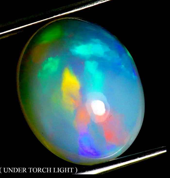 Natural Ethiopian Fire Opal - 6.93ct AAA Hot Rainbow Luster