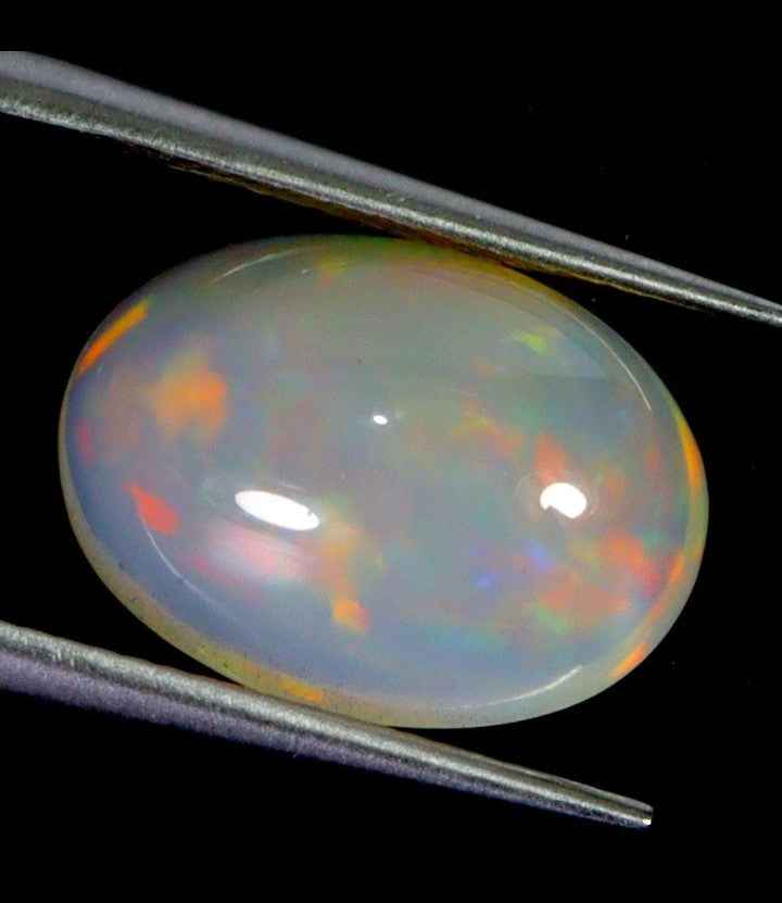 Natural Ethiopian Fire Opal - 6.15 ct Oval Cabochon