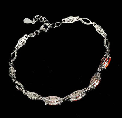 Ethiopian Orange Opal Marquise Cut Sterling Silver Bracelet - 14k White Gold Plated
