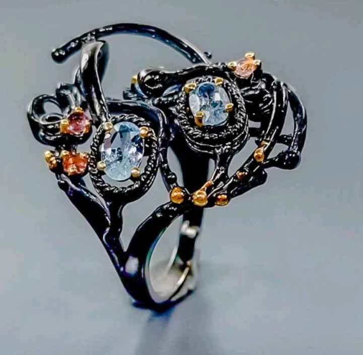 Anello in Argento 925 con Topazio Blu e Placcatura Rodio Nero e Oro