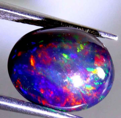 Natural Ethiopian Black Opal - 3.36ct Oval Cabochon