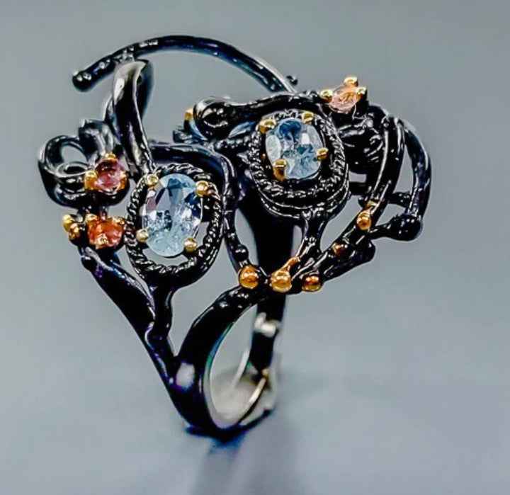 Anello in Argento 925 con Topazio Blu e Placcatura Rodio Nero e Oro